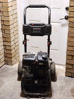 Front view of Simonize Platinum pressure washer showing frame, engine, wheels and handle