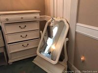 Overall view of chest of drawers and tilt mirror