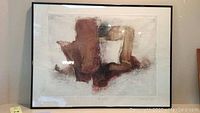 Framed abstract etching artwork featuring brown and beige tones, measuring 30 x 22 inches.