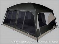 Stock photo showing the dome tent fully set up with multiple mesh windows and a peaked roof, dark gray and light gray color.