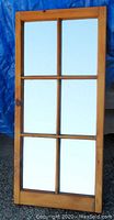 Full view of the vintage pine wood windowed wall mirror showing all six mirror panes and pine frame.