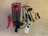 All items laid out on floor showing file set, hammer, mallet, hot glue gun, and cutter