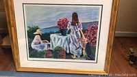 Full view of framed wall art 'Flower Gatherers IV' showing two women and floral arrangements.