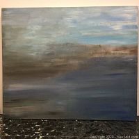 Full front view of the large oil on canvas landscape painting showing blue, gray and brown abstract scenery.