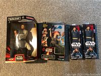 Four Star Wars toys in original boxes including Obi-Wan Kenobi, Jar Jar Binks, and two Captain Cassian Andor figures.