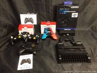 All items in lot including controllers, cooling stand, and boxes