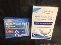 Boxed PTKOONN Teeth Whitening System and LDREAMAM Teeth Whitening Kit boxes side by side