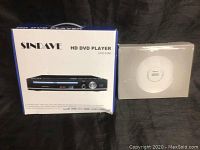 Sindave HD DVD Player box and Gueray portable CD player box unopened.