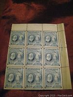 Block of nine 4 cent stamps in a 3 by 3 grid featuring Alexander Graham Bell with blue-grey color.