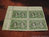 Front view of the block of four green 1939 Canadian stamps showing Princess Elizabeth and Princess Margaret portraits with selvage on the top left.