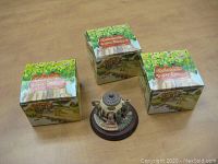 Four resin miniature bear teapot cottage collectible trinket boxes with three in original boxes and one out.