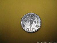 Obverse side of 1944 Canadian 5 cents Victory nickel showing torch, date, large V, and maple leaves.