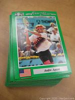 Stack of 1991 NetPro Tour Star tennis trading cards showing Andre Agassi on top card