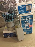 Overall shot showing de-icer unit, C-20 control box and housing, zinc anode bag and coiled cable