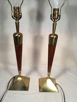 Full view of both lamps showing brass bases, wood shafts, harps and shades