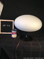 Full side view of lamp with Campbell’s soup can for scale.