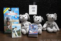 Photo showing three Bamm Beano Yankees '98 Champs plush figures of Darryl Strawberry, David Wells, Orlando Hernandez with trading card stacks and Headliners Bernie Williams figure in the background.