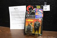 Photo showing the TurboJet Batman figure in original packaging alongside the Certificate of Authenticity.