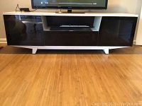 Front view of media console with TV (not included)