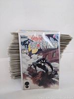 Stack of all comics with Web of Spider-Man #1 in protective sleeve at front