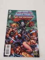 Front cover of He-Man And The Masters Of The Universe issue #1 comic book showing colorful characters and title.