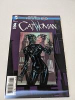 Front cover of Catwoman Futures End DC Comic No. 1 showing reflective effects on cover art.