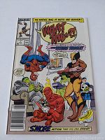 Front cover of 'What The..?' comic book featuring parody Marvel characters in humorous scene.