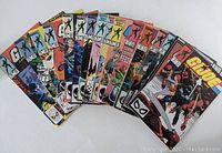 19 Marvel G.I. Joe comic books fanned out displaying cover art and issue numbers, showing a range of colorful covers and characters.
