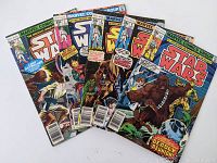 Group photo showing five Star Wars Marvel comics laid out, issues 5,7,8,9,13 visible.