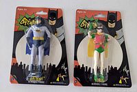Front view of Batman and Robin bendable figures in original packaging showing characters, colors and design details.