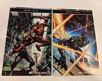 Front covers of Marvel Knights #4 and #5 Black Panther comic books with Stan Lee memorial banners