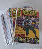 Stack of bagged Rogue Trooper comic books, showing issue #1 at the front with yellow cover and the character firing a gun.