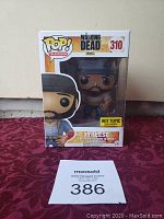 Funko Pop! Tyreese figure boxed, front angled view showing branding, figure, and labels.