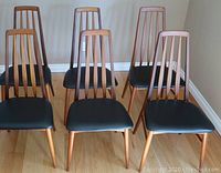 Six chairs arranged in two rows facing forward