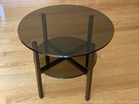 Front three-quarter view of entire table on hardwood floor