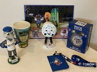 Full lot view including all memorabilia and the puzzle in the background