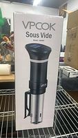 Boxed Vpcok sous vide cooker model 004503 showing appliance image and model number