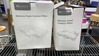 Two Marnur Memory Foam Contour Pillow boxes shown, one box slightly worn and open