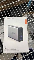 Front of box showing product image and brand name Satechi with model info 75W Dual USB-C PD travel charger.
