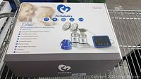 Box of Bellababy rechargeable electric breast pump showing product info and image.