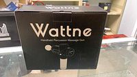 Front view of the Wattne massage gun boxed packaging.