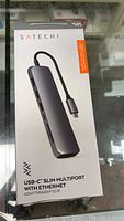 Front of the box showing the SATECHI USB-C slim multiport adapter with Ethernet, brand and model name.
