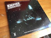Front cover of gatefold vinyl album showing Darth Vader and Star Wars Empire Strikes Back title.