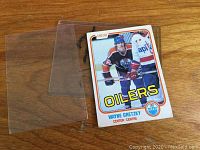 Front of Wayne Gretzky rookie card showing image of Gretzky in Oilers uniform with team information