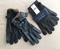 Two pairs of new leather gloves: brown Tommy Hilfiger fleece lined touchscreen gloves and black leather gloves with camel wool lining and buckle strap.