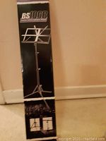 Box and packaging for Yorkville BS 106B telescopic folding music stand showing brand and model details.