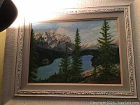 Full image of framed acrylic painting showing scenic mountain lake and pine tree landscape.