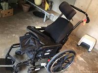 Side view of Fusion wheelchair showing seat, backrest, footrests, headrest