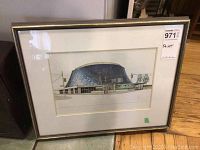 Framed print of Roy Thompson Hall shown with a reflective glass and thin gold/black frame