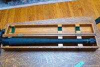 Spyglass fully collapsed in wooden case showing length and lining